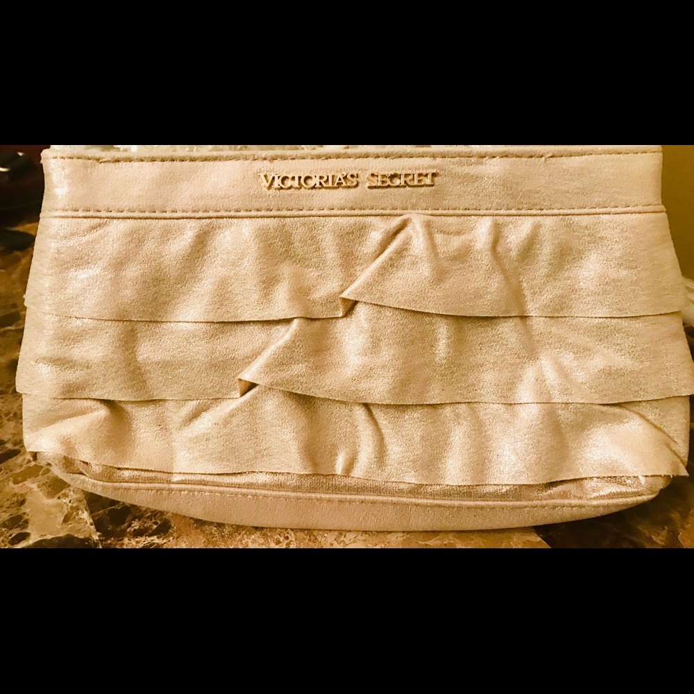 Victoria’s Secret clutch handbag. Measures 12 x 5